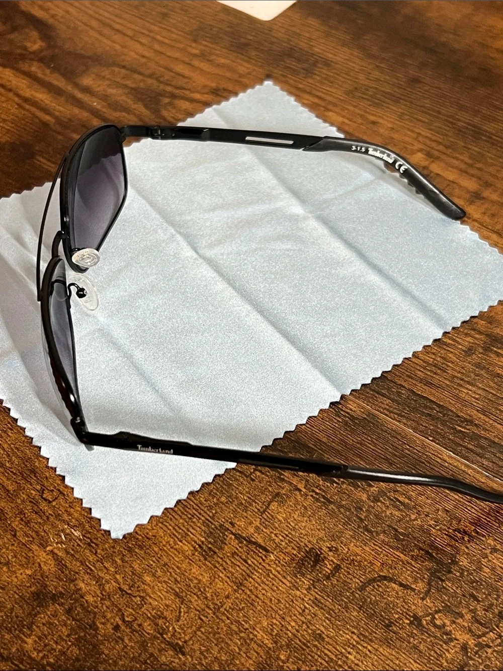 Timberland Black Frames with Dark Purple Lenses Aviator Sunglasses